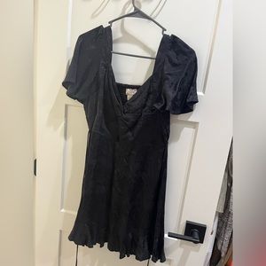 Twist front silk dress.